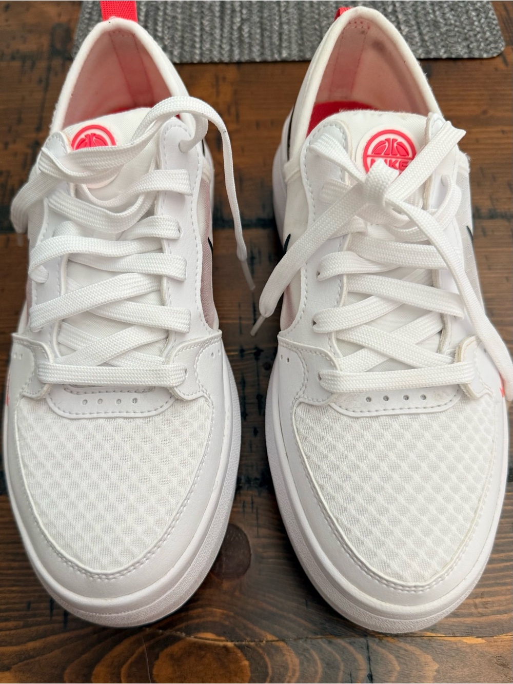 Nike White Sneakers with Pink Highlights